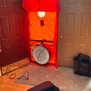 a blower door test being performed Belleville MI